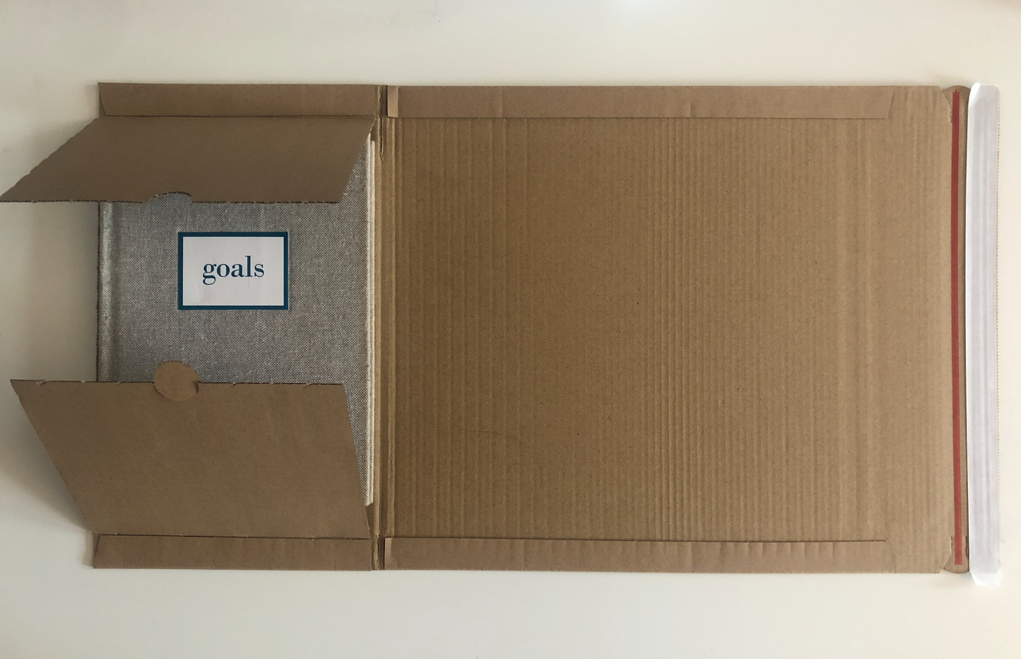 BWR07 460 x 335 x (100) Book Wrap Brown 400gsm corrugated board Peel & Seal